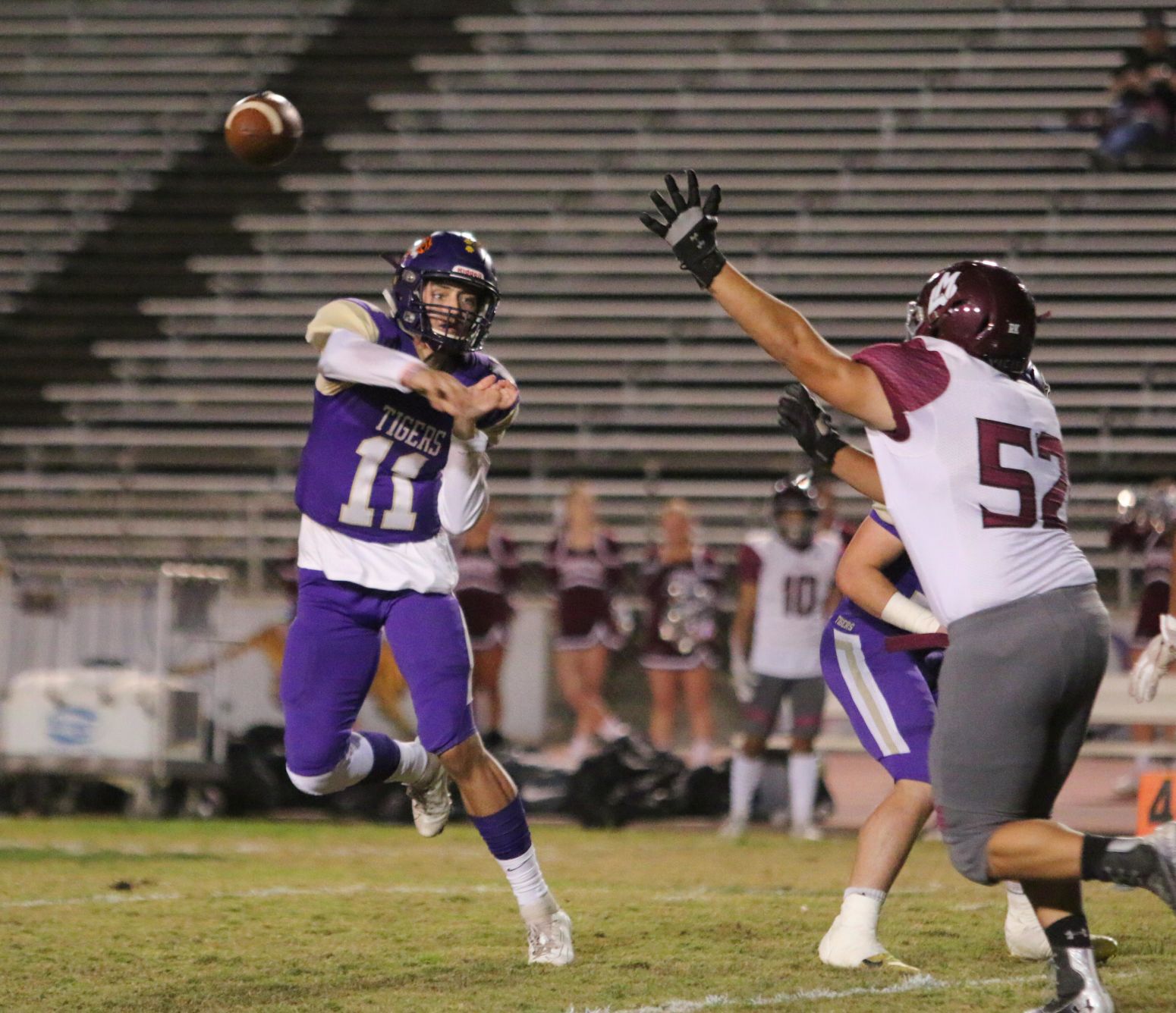 Tigers stay hot with 42-6 rout of Pioneers, clinch playoff spot